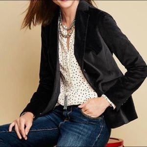 Black velvet blazer. Multiple buttons for a modern fit. Size 10.